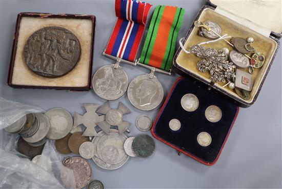 A collection of WWI and WWII General Service medals, costume jewellery and sundry coinage including a GV four coin maundy set 1922